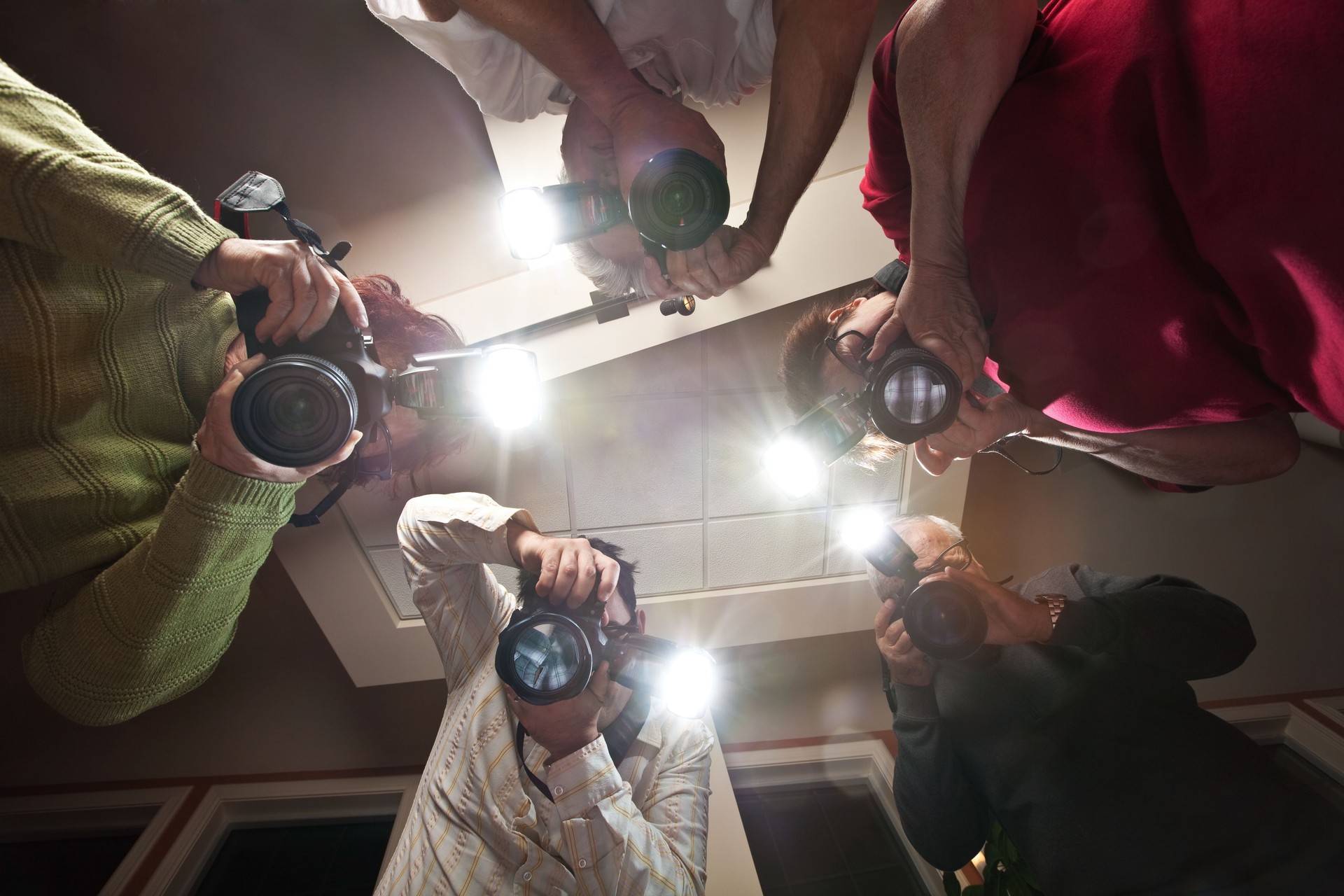 Paparazzi Photographers Shooting a Victim of Crime